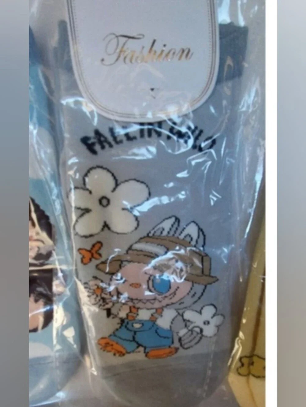 5 pairs of the ugly but cute Labubu Character footies Socks.
